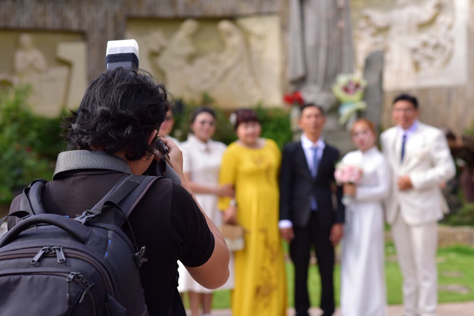 Professional wedding photographer at work capturing memories