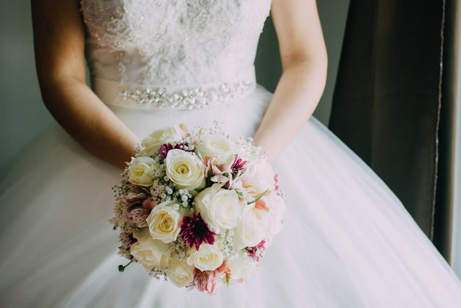 Beautiful bride holding bouquet